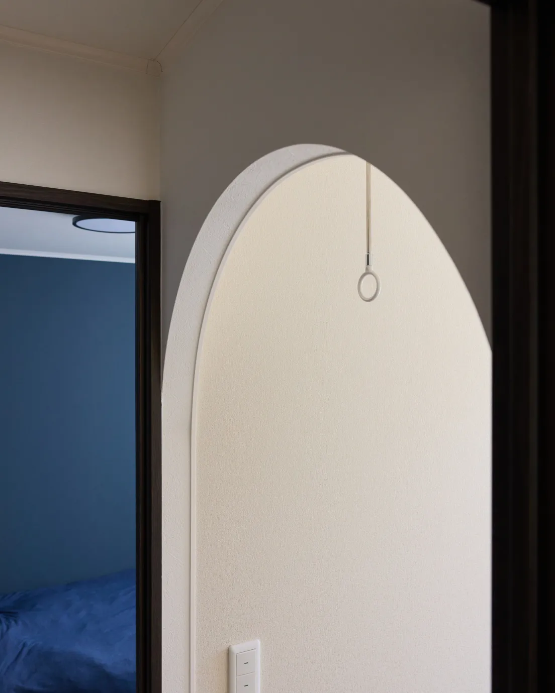 サンルーム入口のアーチ形状は奥様のこだわり